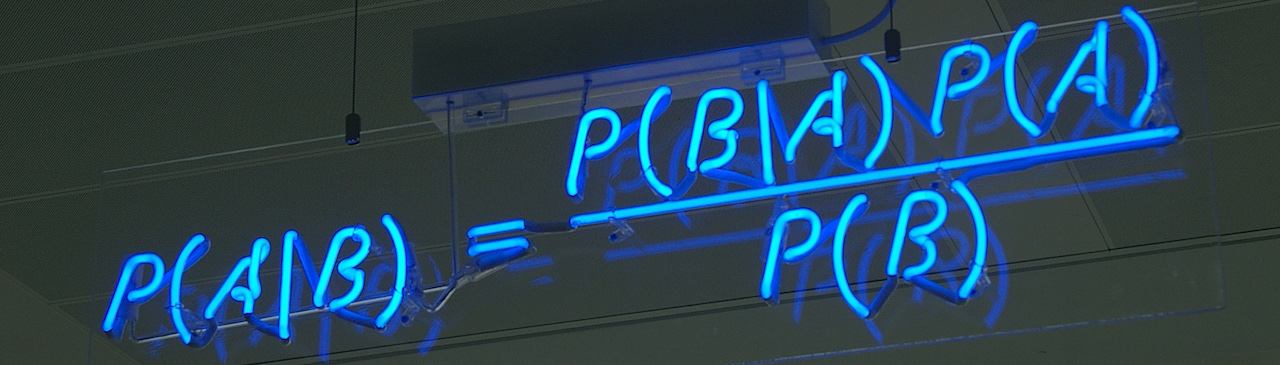 Photo of Neon Sign with Bayes Theorem.